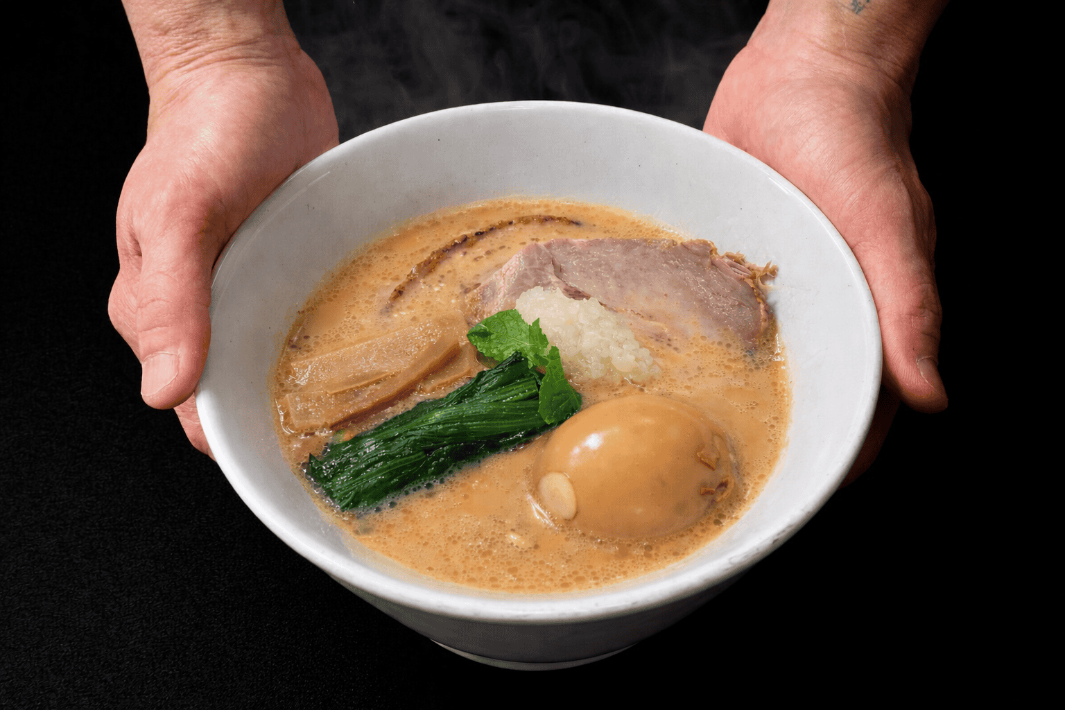 Authentic Japanese tonkotsu ramen — rich milky-white pork bone broth with traditional toppings